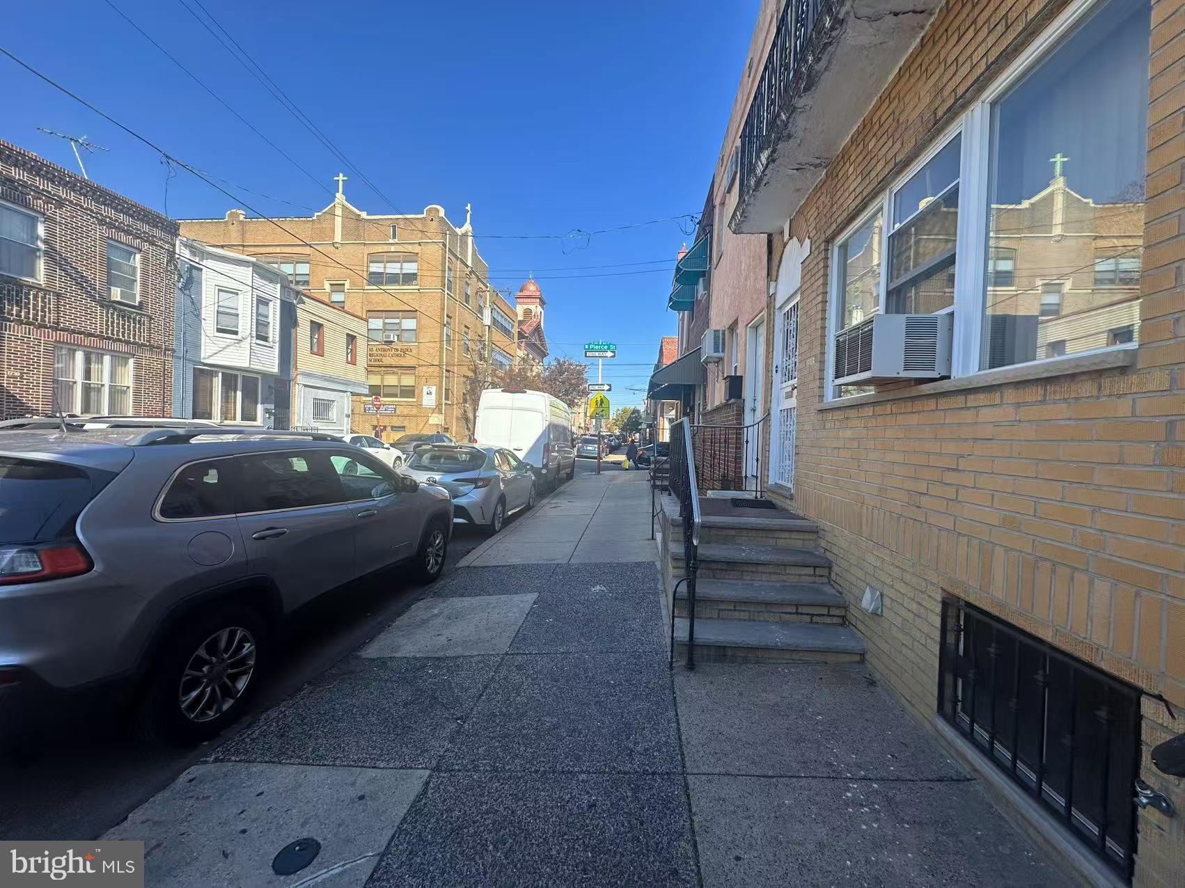 1733 South 9th Street Philadelphia, PA 19148 - Photo 3 of 14 a couple of cars parked in front of a building