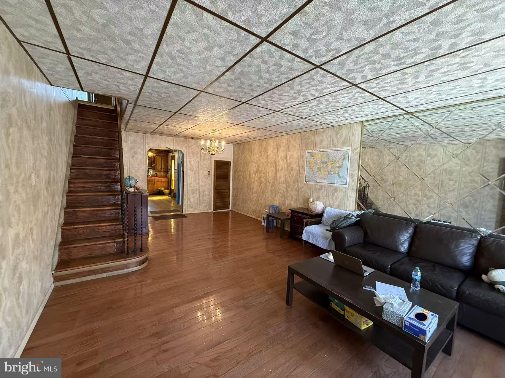 1733 South 9th Street Philadelphia, PA 19148 - Photo 5 of 14 a living room with furniture and a wooden floor