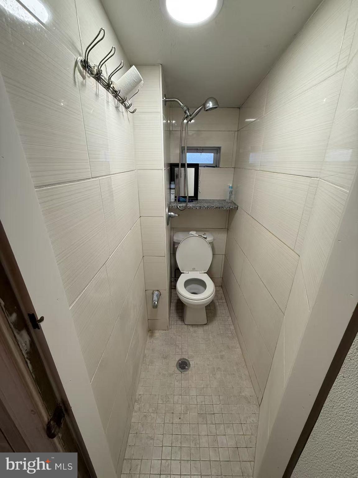 1733 South 9th Street Philadelphia, PA 19148 - Photo 7 of 14 a bathroom with a toilet and a shower