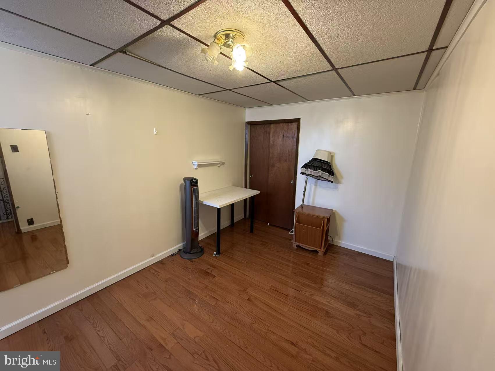 1733 South 9th Street Philadelphia, PA 19148 - Photo 10 of 14 a room with gym equipment and a ceiling fan
