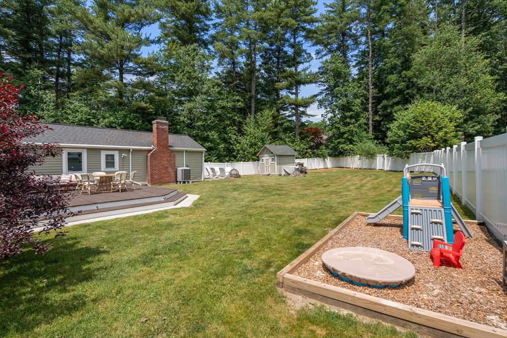 57 Marlboro Road Sudbury, MA 01776 - Photo 33 of 40 a house view with a sitting space and garden view