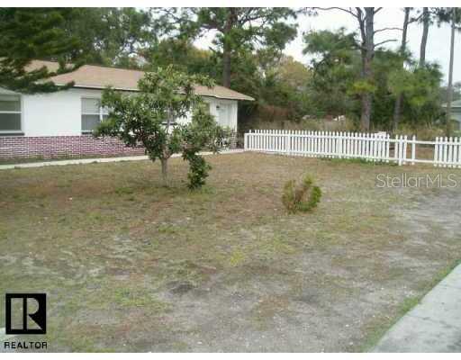 1997 Trotter Road Largo, FL 33774 - Photo 3 of 5 a view of a house with a yard