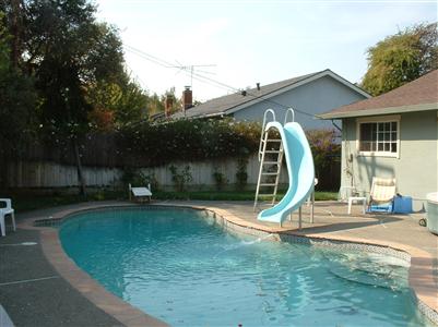2437 Center Road Novato, CA 94947 - Photo 2 of 7 a view of a house with a backyard