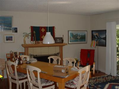 2437 Center Road Novato, CA 94947 - Photo 5 of 7 a living room with furniture a flat screen tv and kitchen view