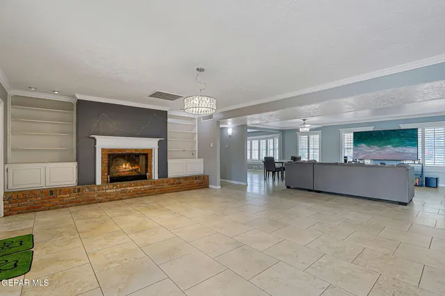 a kitchen with a sink cabinets and window