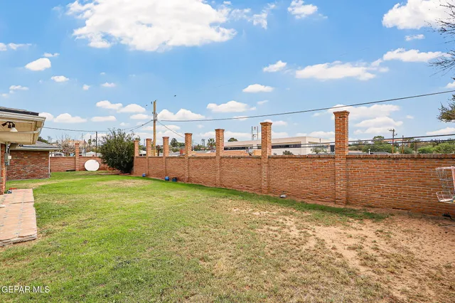 a view of balcony with couch and chairs