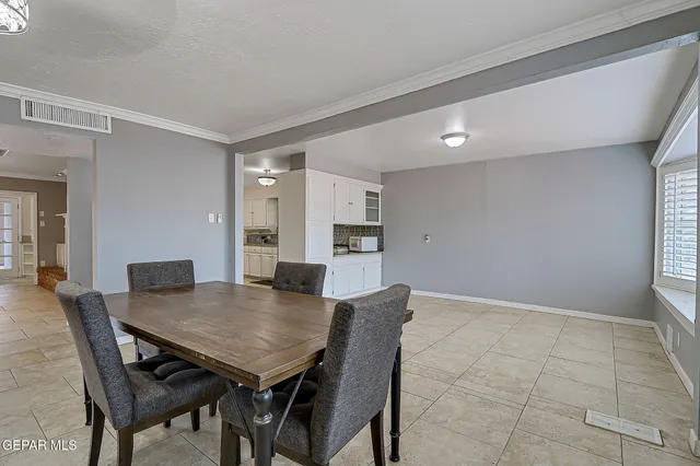 a view of a dining room with furniture