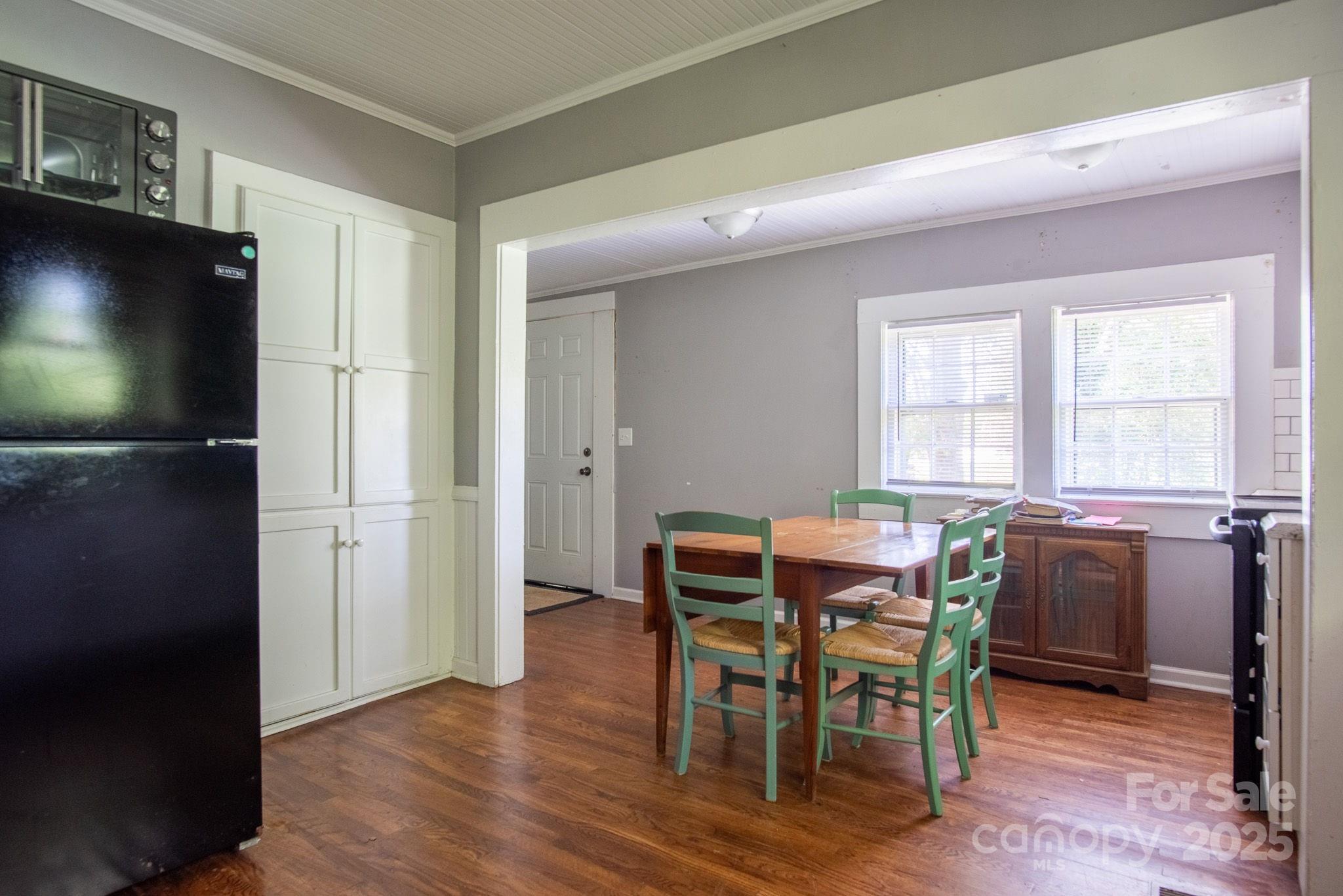 109 Fulton Street, Unit 9 Kings Mountain, NC 28086 - Photo 16 of 46 a view of a dining room with furniture and window