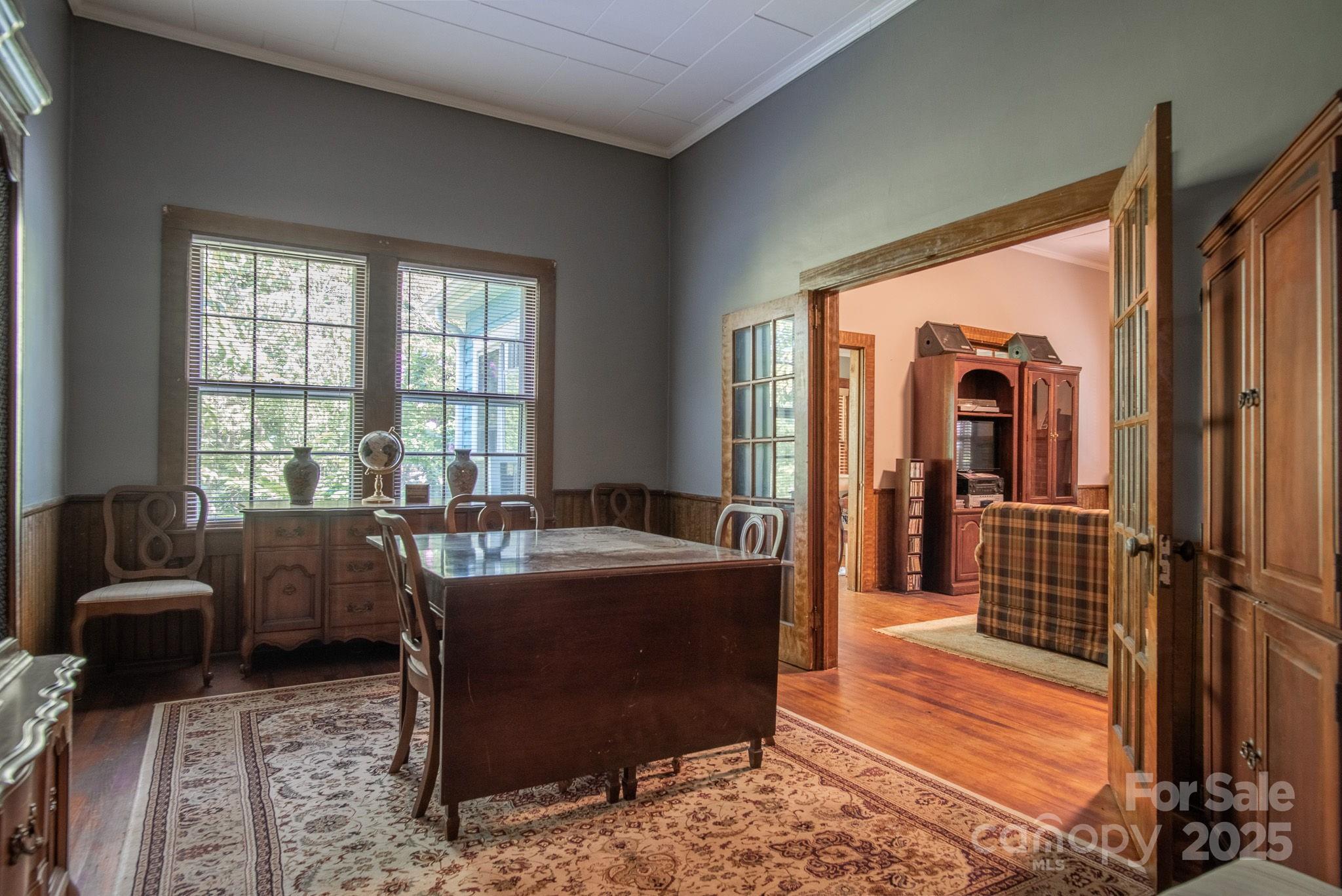 109 Fulton Street, Unit 9 Kings Mountain, NC 28086 - Photo 17 of 46 a living room with furniture and a floor to ceiling window