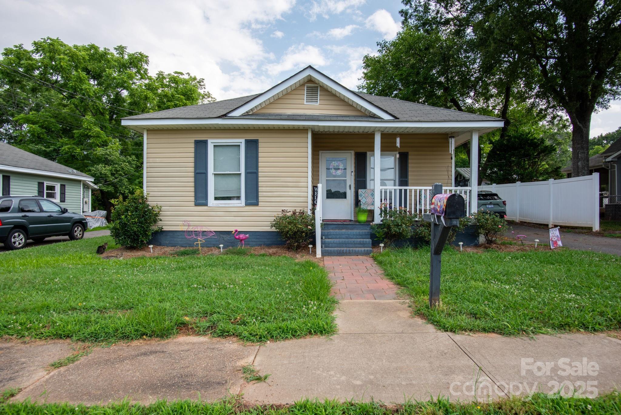 109 Fulton Street, Unit 9 Kings Mountain, NC 28086 - Photo 25 of 46 a front view of a house with a yard