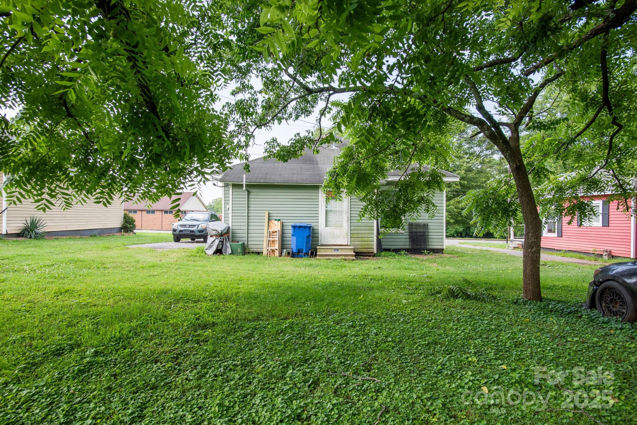 109 Fulton Street, Unit 9 Kings Mountain, NC 28086 - Photo 28 of 46 a view of a house with backyard and a tree