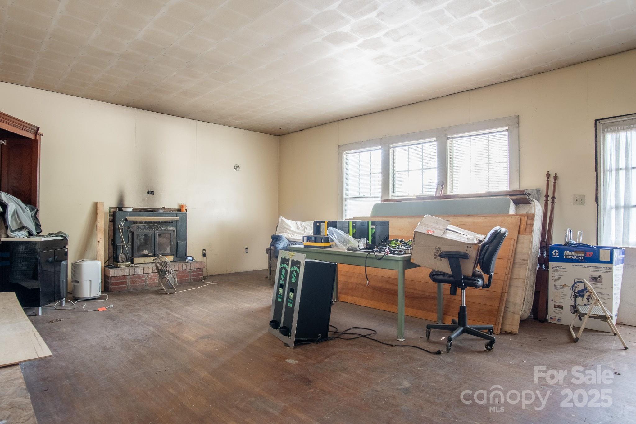 109 Fulton Street, Unit 9 Kings Mountain, NC 28086 - Photo 45 of 46 a view of a livingroom with workspace and a window
