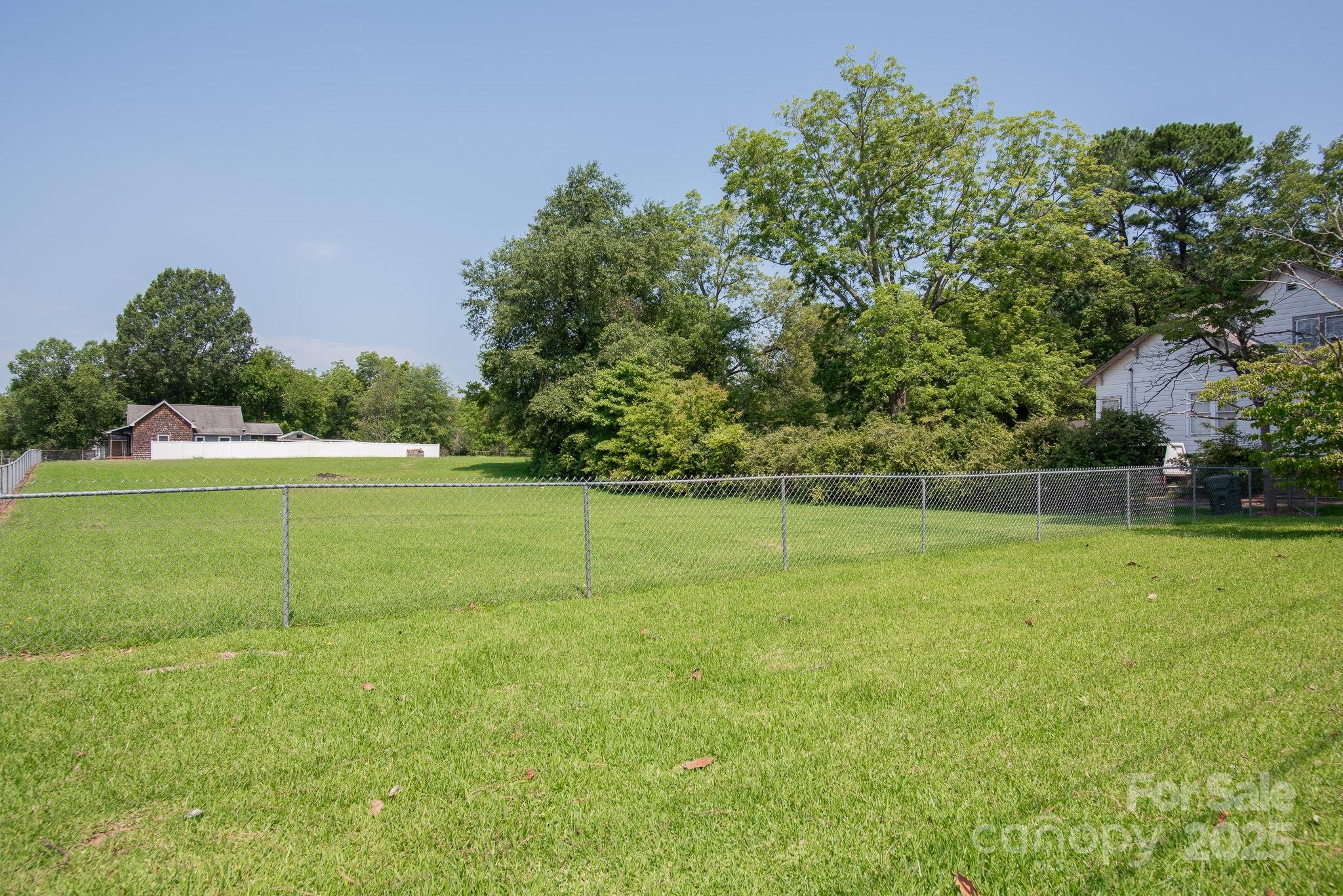109 Fulton Street, Unit 9 Kings Mountain, NC 28086 - Photo 46 of 46 a view of a field with an trees