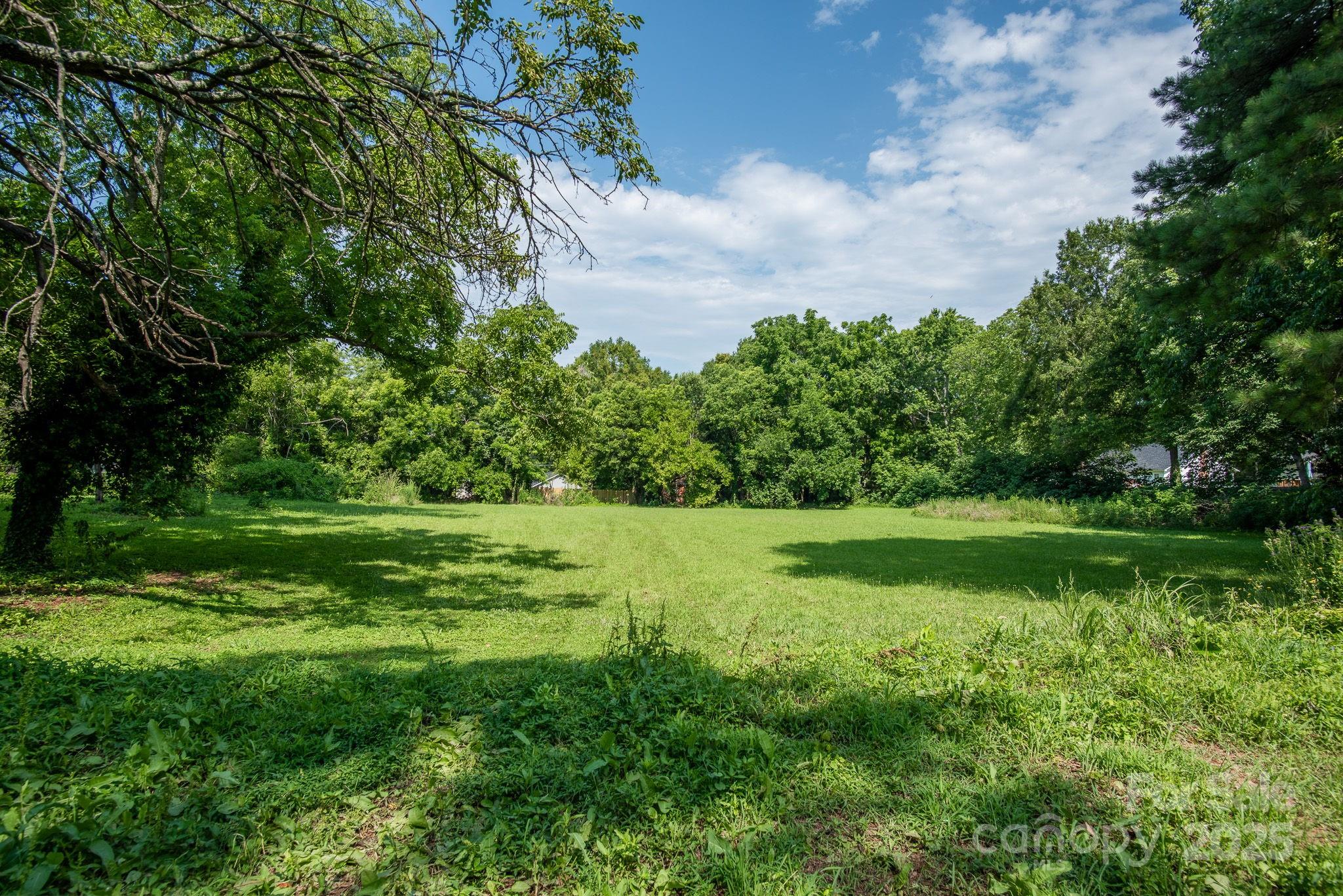 109 Fulton Street, Unit 9 Kings Mountain, NC 28086 - Photo 7 of 46 a view of a golf course with a lake