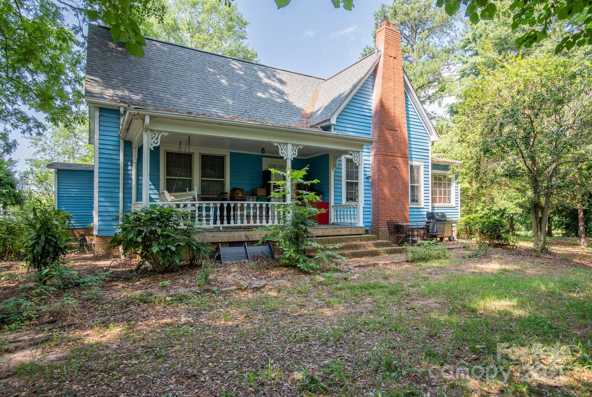 109 Fulton Street, Unit 9 Kings Mountain, NC 28086 - Photo 10 of 46 a view of a house with backyard and garden