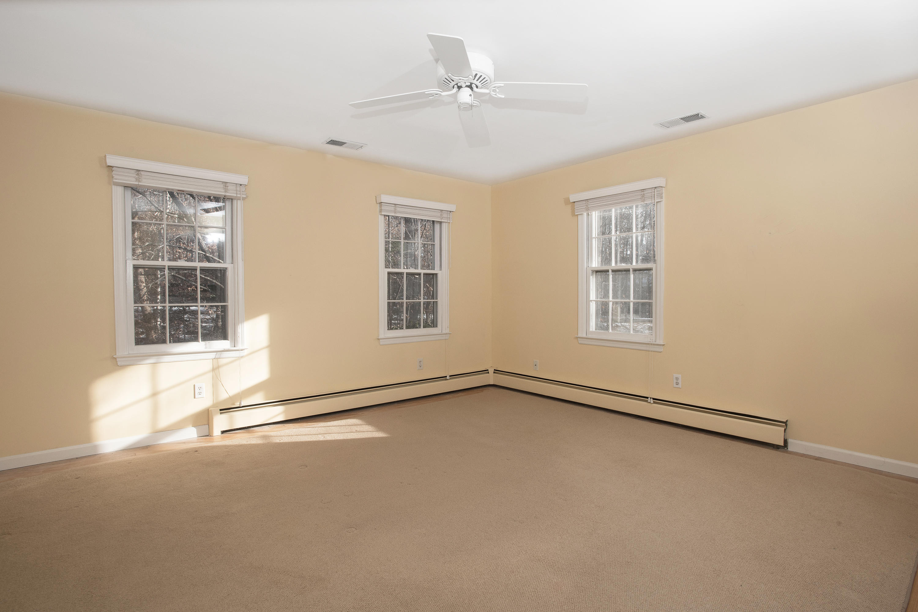 286 Indian Rock Road New Canaan, CT 06840 - Photo 14 of 24 an empty room with windows