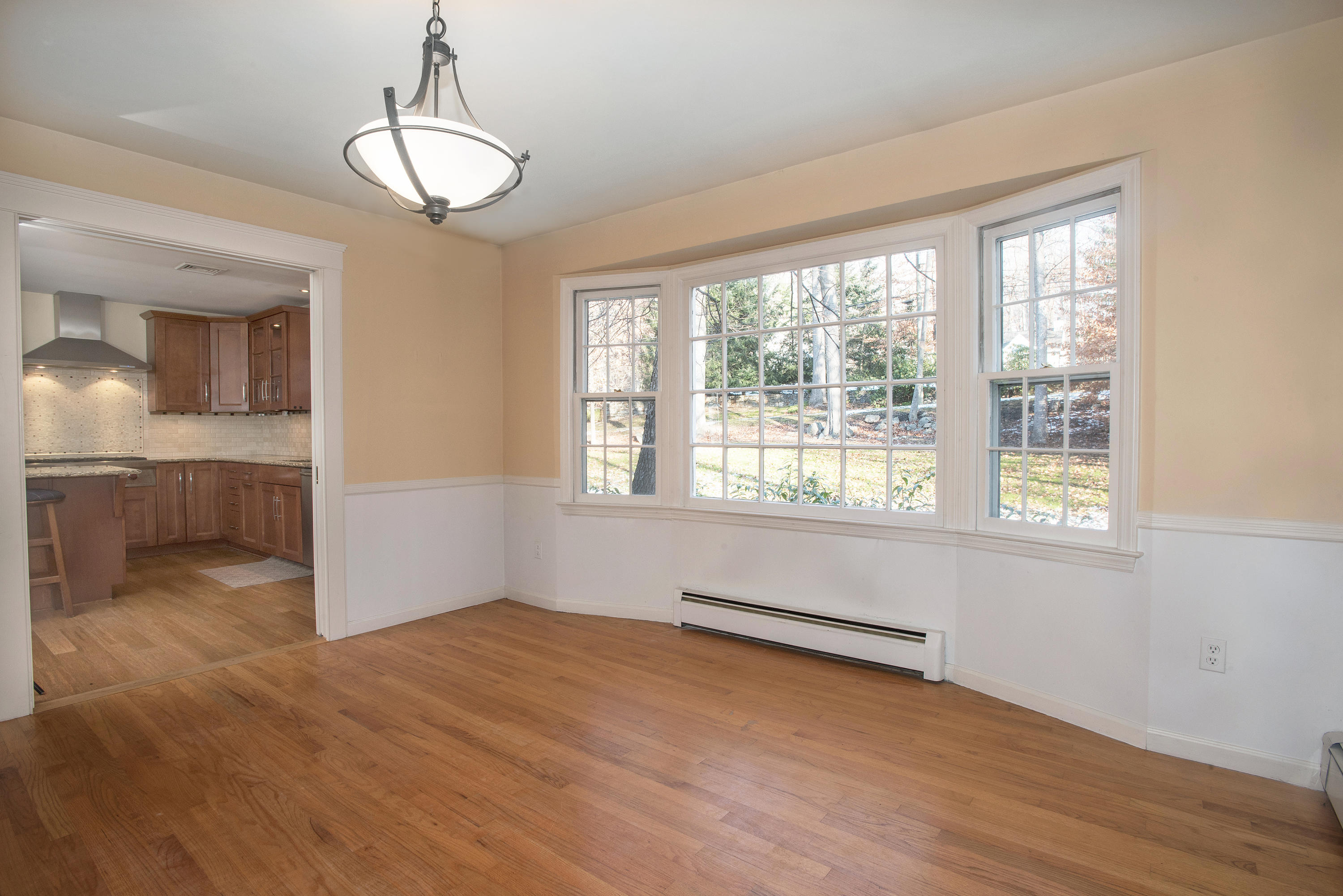 286 Indian Rock Road New Canaan, CT 06840 - Photo 7 of 24 a view of room with window and hardwood floor
