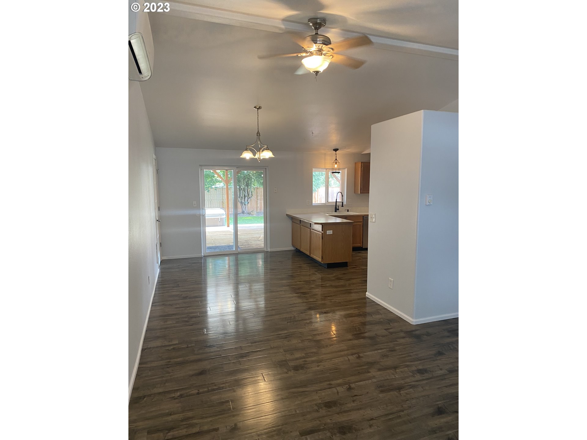 954 Aldridge Place Springfield, OR 97478 - Photo 4 of 32 a view of a room with wooden floor