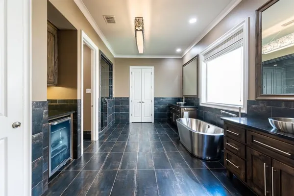 a large kitchen with a large window