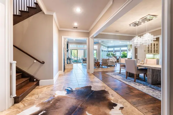 a lobby with furniture and wooden floor