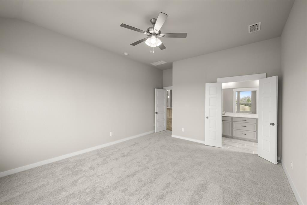 409 Rivers Edge Drive Waxahachie, TX 75167 - Photo 13 of 27 409 Rivers Edge- Primary Suite-2
