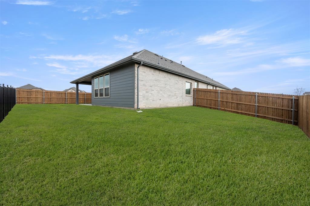 409 Rivers Edge Drive Waxahachie, TX 75167 - Photo 26 of 27 409 Rivers Edge- Back-2