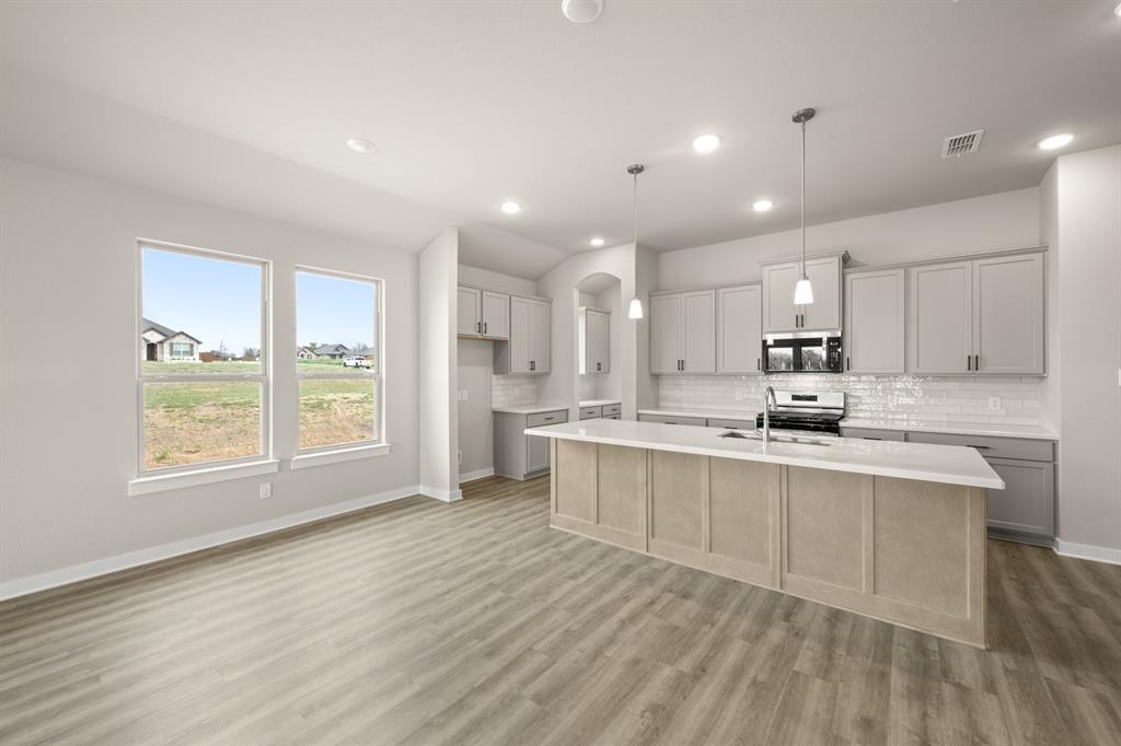 409 Rivers Edge Drive Waxahachie, TX 75167 - Photo 8 of 27 409 Rivers Edge- DIning-1