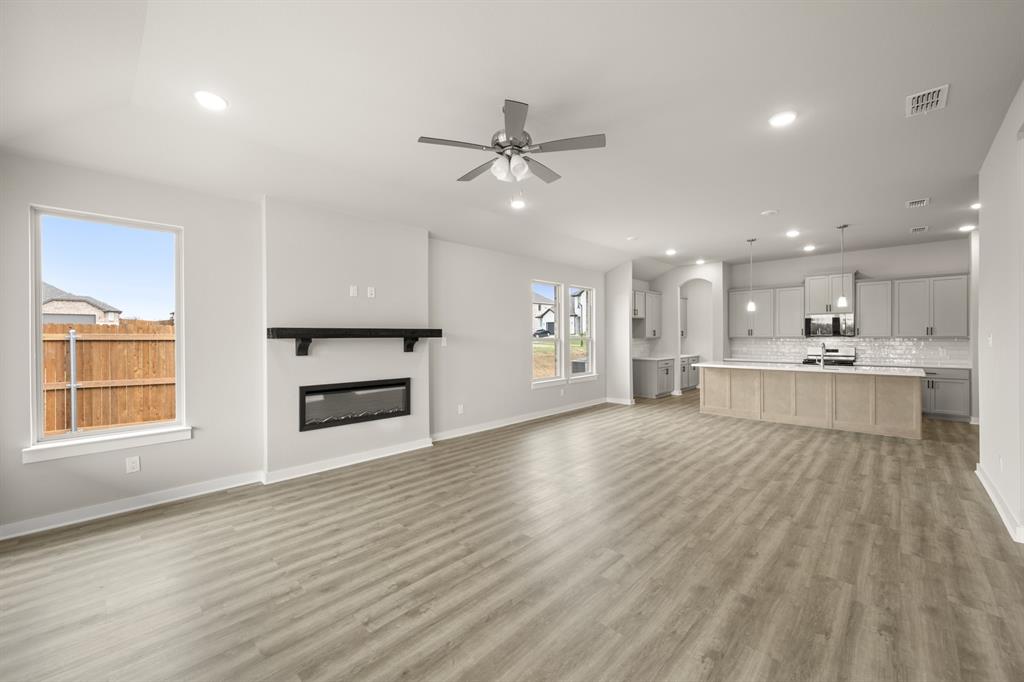 409 Rivers Edge Drive Waxahachie, TX 75167 - Photo 10 of 27 409 Rivers Edge- Living Room-1