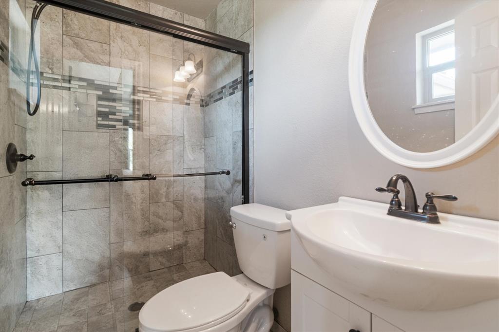 8463 Crestview Road Sanger, TX 76266 - Photo 20 of 36 Bathroom with vanity and a shower stall