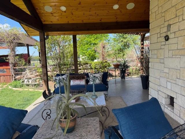 8463 Crestview Road Sanger, TX 76266 - Photo 4 of 36 View of patio featuring an outdoor hangout area