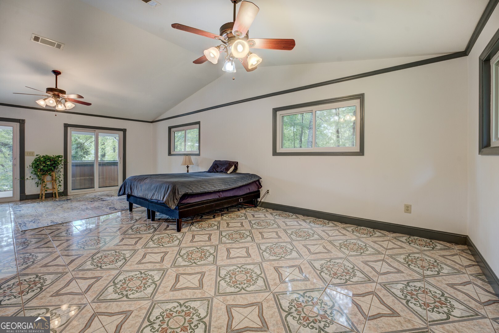 2188 Highway 36 East Jackson, GA 30233 - Photo 31 of 74 a living room with a couch and a chandelier