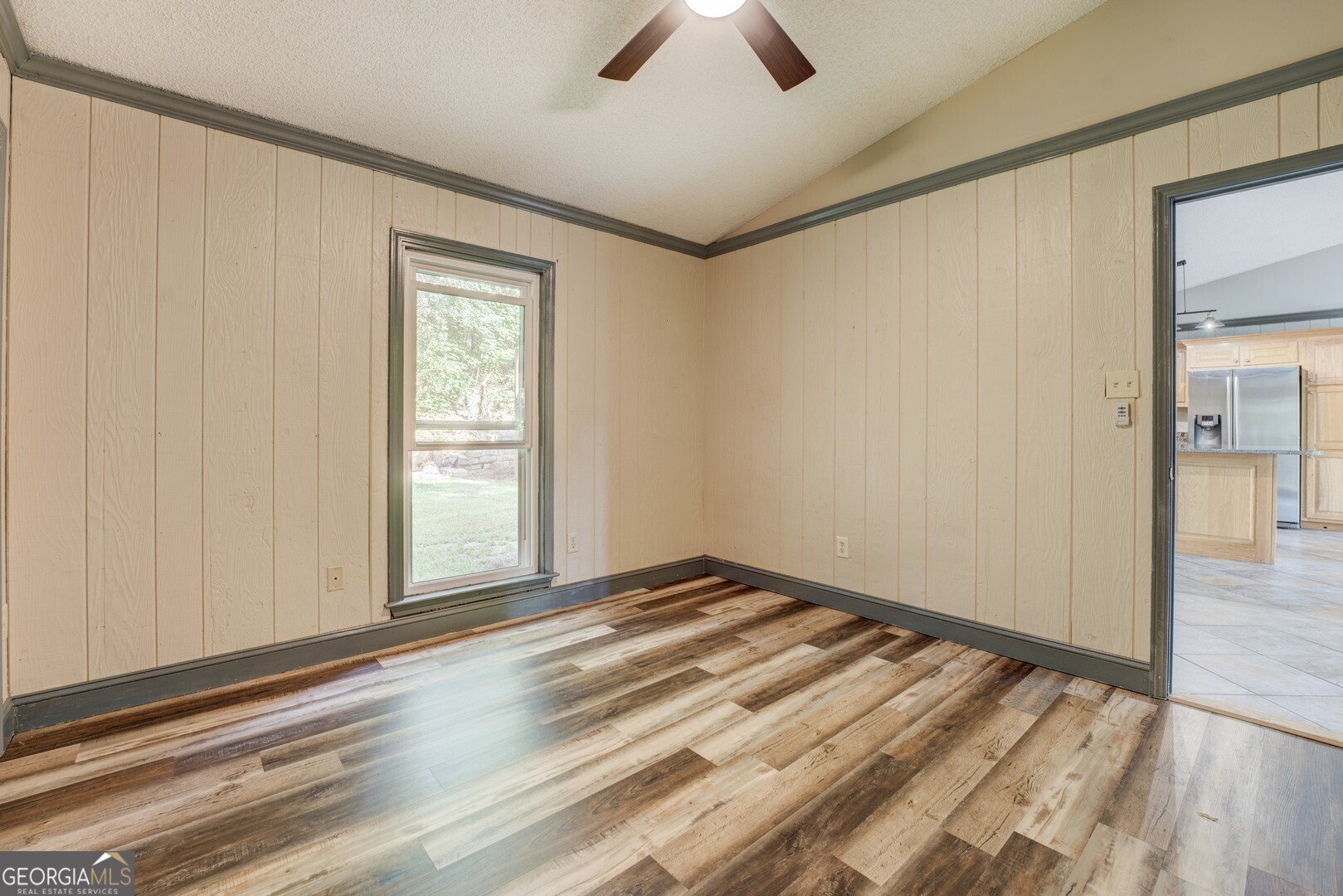 2188 Highway 36 East Jackson, GA 30233 - Photo 41 of 74 a view of an empty room with window and wooden floor