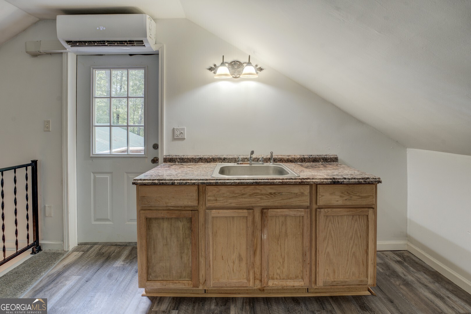 2188 Highway 36 East Jackson, GA 30233 - Photo 60 of 74 a bathroom with a granite countertop sink toilet and vanity