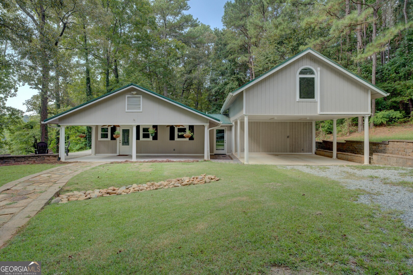2188 Highway 36 East Jackson, GA 30233 - Photo 6 of 74 a front view of a house with a garden