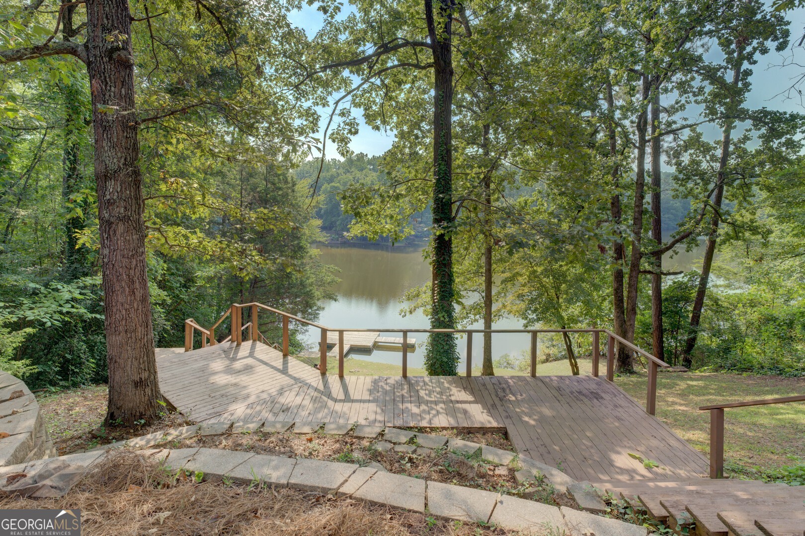 2188 Highway 36 East Jackson, GA 30233 - Photo 64 of 74 a view of a lake with a bench
