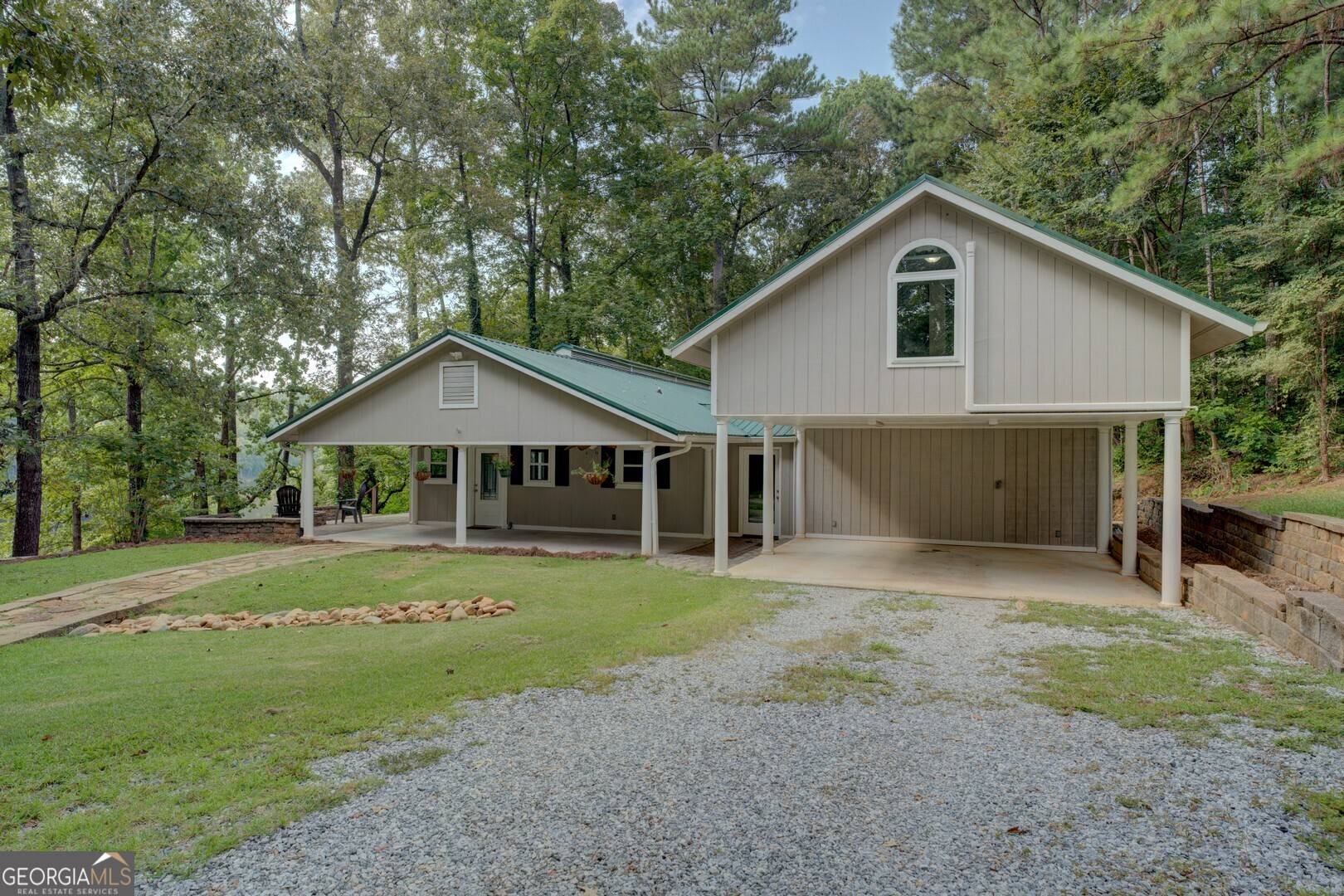 2188 Highway 36 East Jackson, GA 30233 - Photo 8 of 74 a front view of a house with a yard and garage