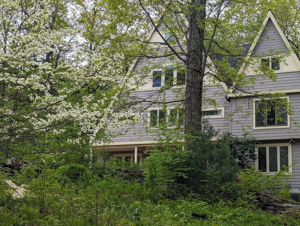 184 Old Bolton Road Stow, MA 01775 - Photo 1 of 1 a view of a house with a tree