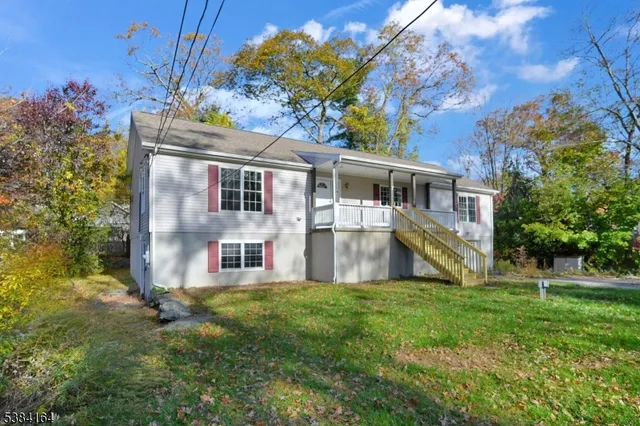 a house view with a garden space