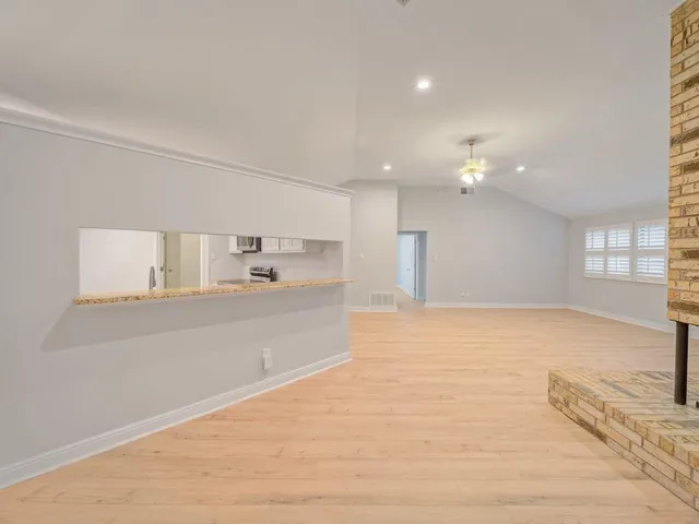 a view of kitchen with wooden floor