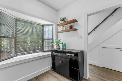 a kitchen with stainless steel appliances granite countertop a stove and a refrigerator