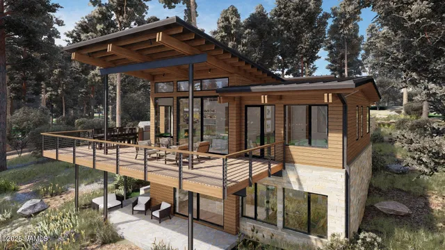 a view of a chair and tables in the patio in front of house