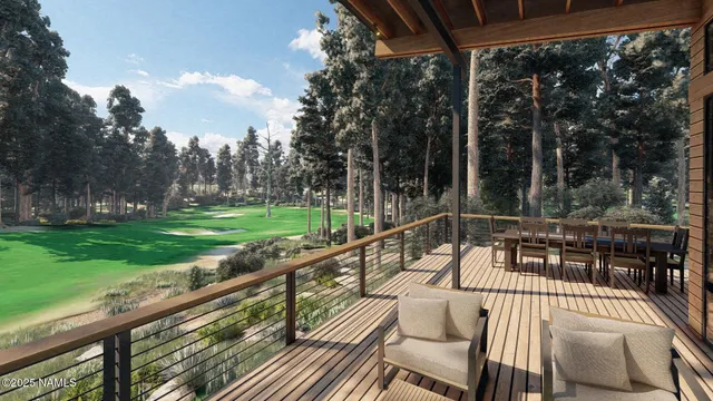 a view of a patio with a table chairs and a backyard