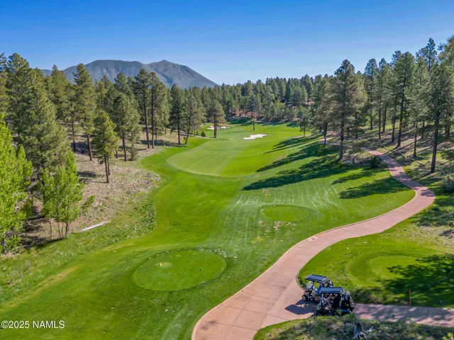 a view of a golf course with a garden
