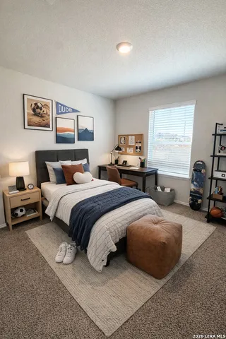 a bedroom with double bed and a window