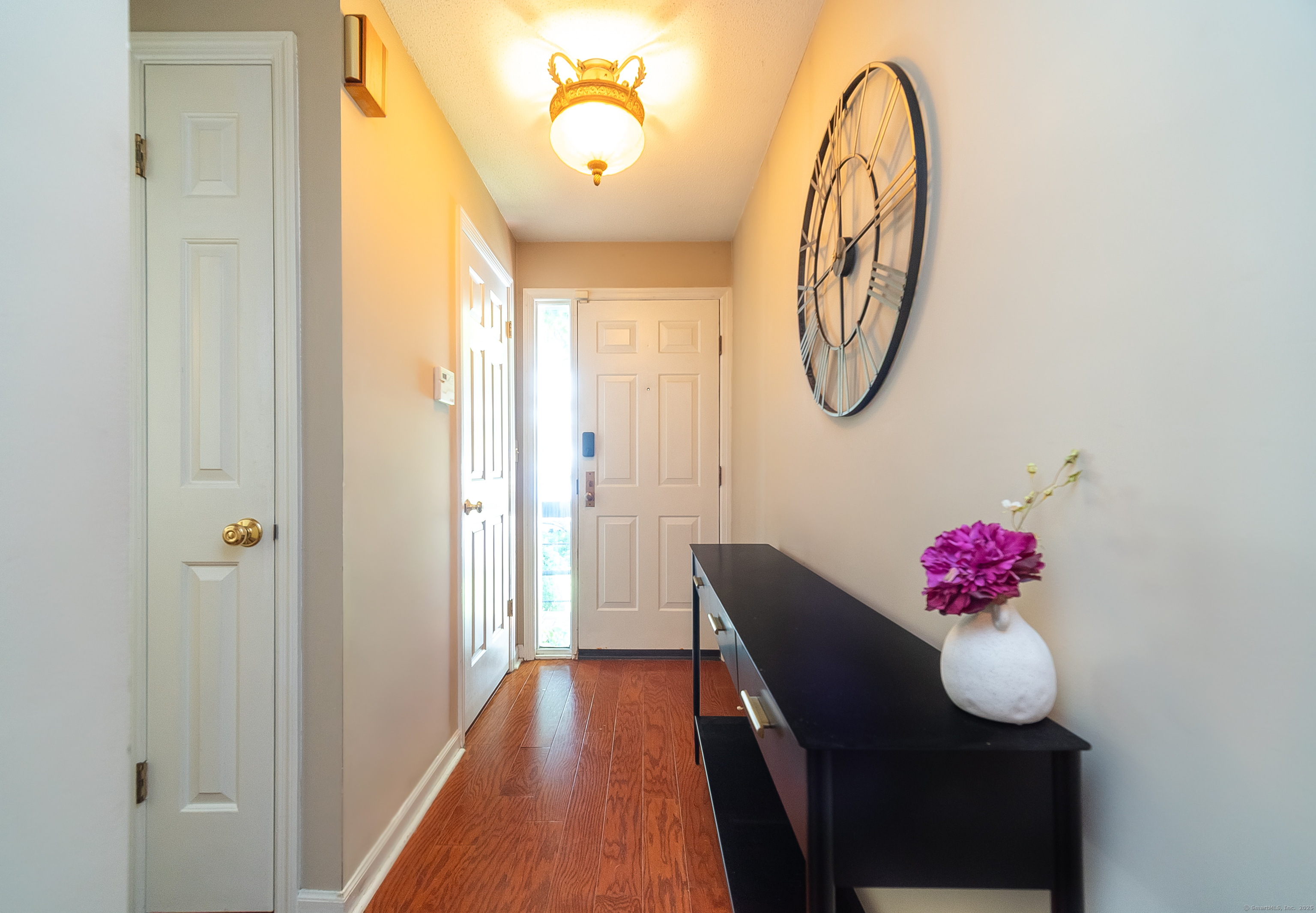 109 Highland Road, Unit 109 Stamford, CT 06901 - Photo 14 of 37 a view of dining room with wooden floor