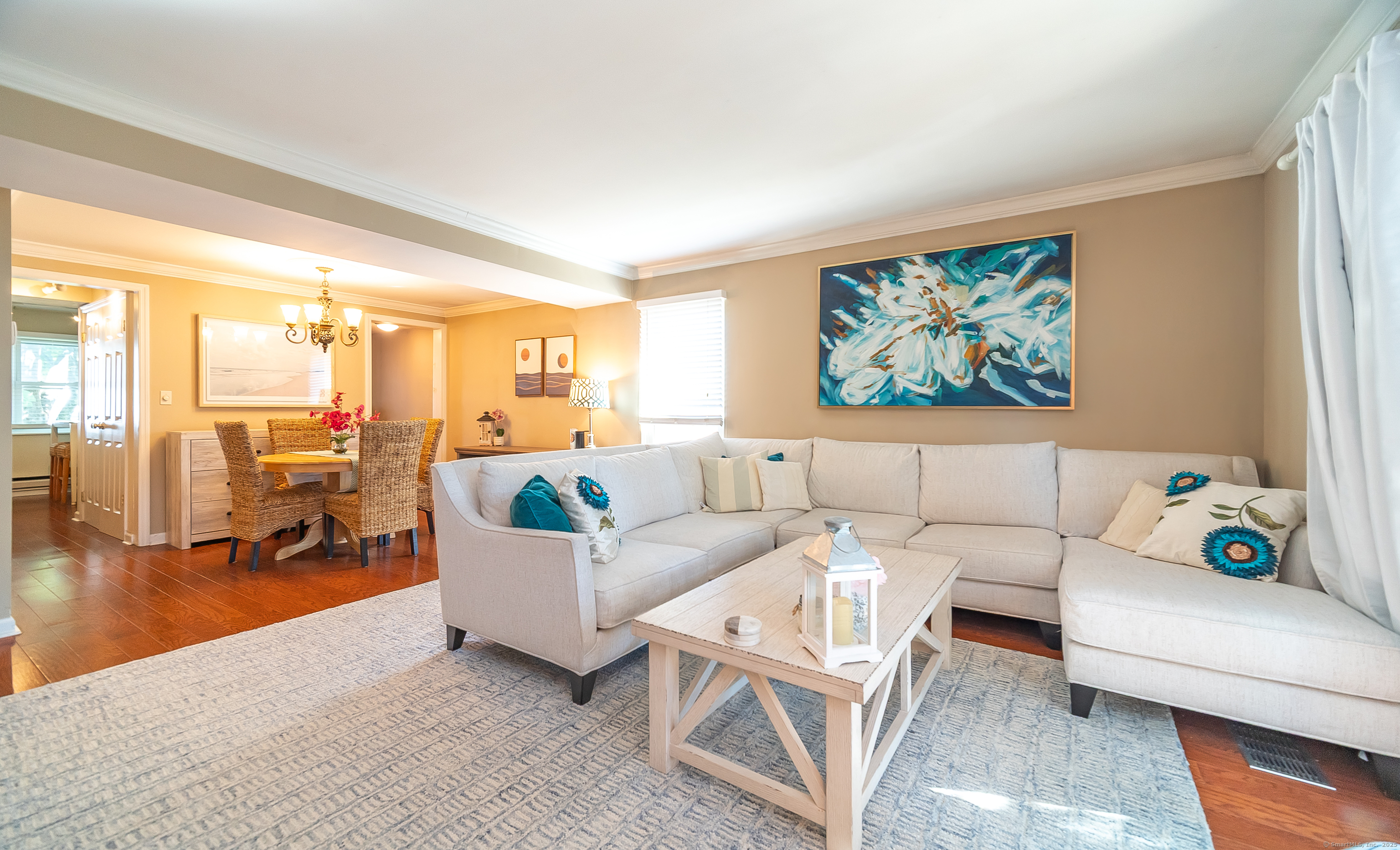 109 Highland Road, Unit 109 Stamford, CT 06901 - Photo 27 of 37 a living room with furniture and a large window