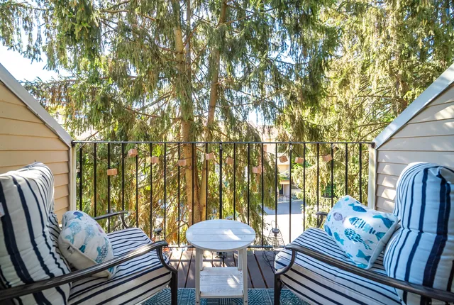 a view of a patio with furniture