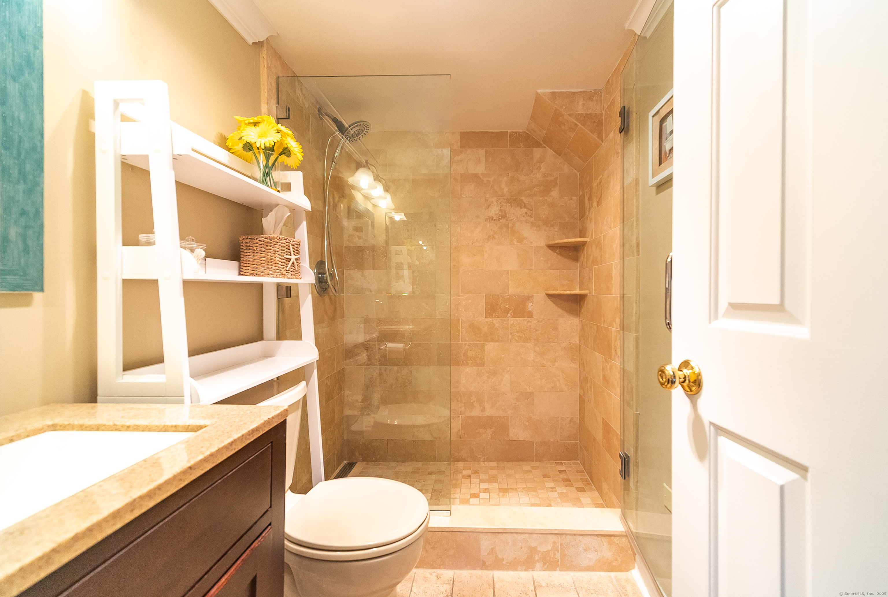 109 Highland Road, Unit 109 Stamford, CT 06901 - Photo 35 of 37 a bathroom with a sink a toilet and shower