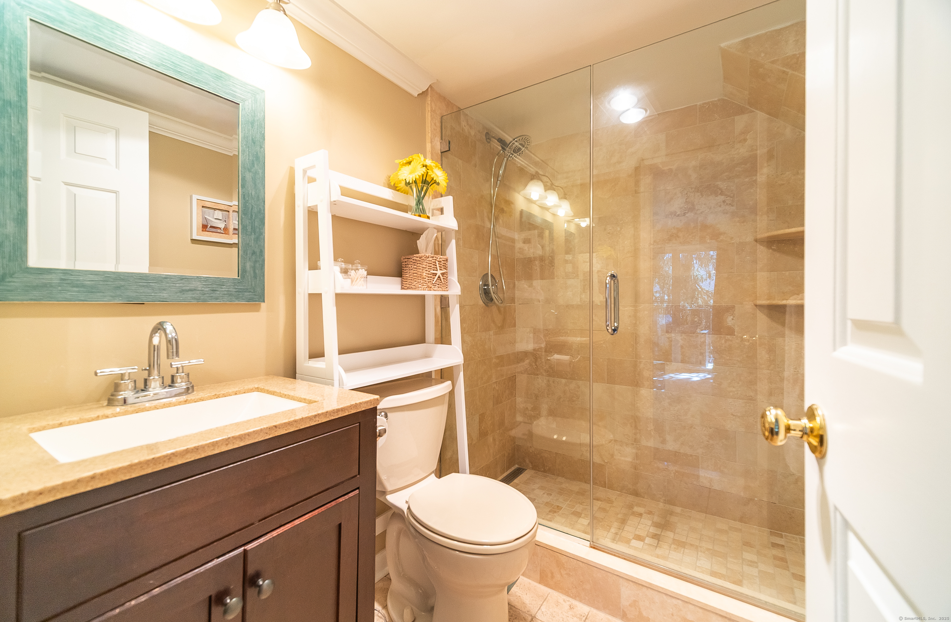 109 Highland Road, Unit 109 Stamford, CT 06901 - Photo 36 of 37 a bathroom with a sink a toilet and shower