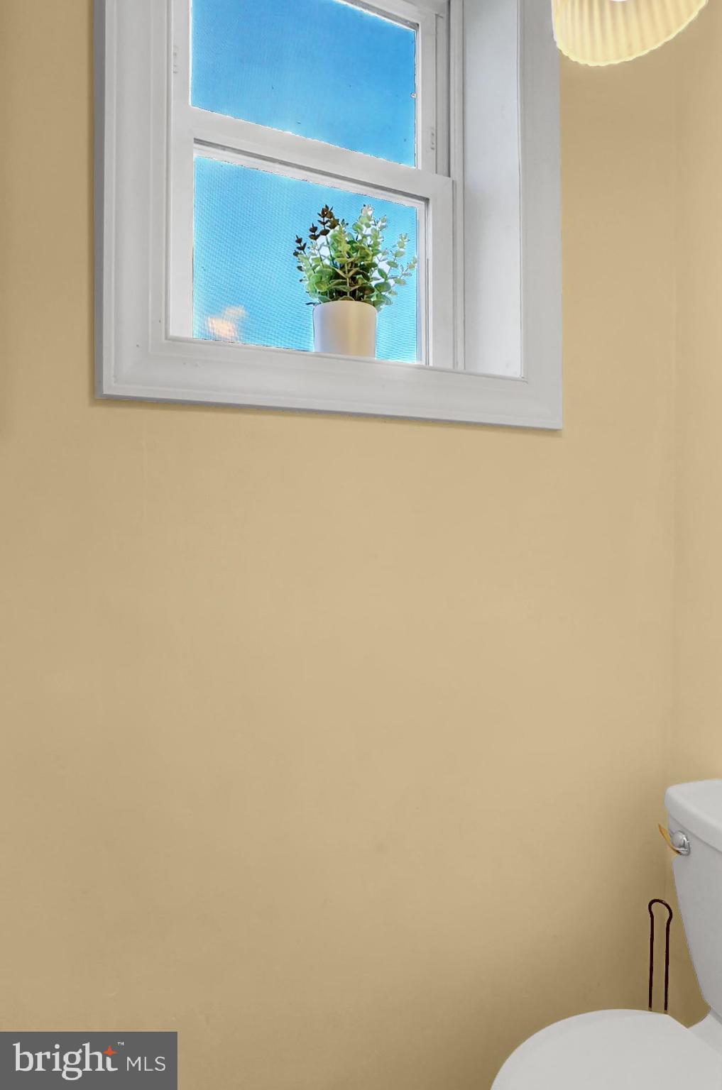 21 West Broad Street Reading, PA 19607 - Photo 13 of 33 2nd bathroom (commode only) - 1st floor